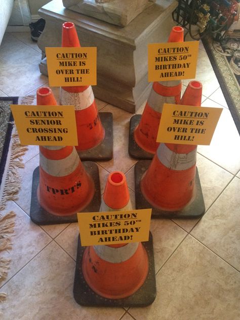 I was able to borrow these construction cones from my dad for an "Over the Hill" 50th birthday party that I did for a client. Each paper had a different sign. They lined the steps going up to the house. It was a perfect entrance to poke fun at the Birthday Boy! http://eventsbyashleymaegan.com/ 50th Birthday Decoration Ideas For Men, Funny 50th Birthday Ideas, Caution Signs, 50th Birthday Party Ideas For Men, Surprise 50th Birthday Party, Surprise 50th, Moms 50th Birthday, 50th Birthday Decorations, 50th Birthday Funny