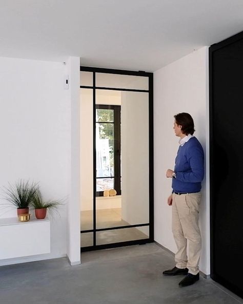 Industrial glass pivot door [Video] | Glass doors interior, Doors interior modern, Door glass design Swivel Door Ideas, Glass Pivot Door Interiors, Hallway Glass Door, Pivot Interior Door, Glass Hallway Door, Door To Close Off Hallway, Industrial Glass Door, Interior Glass Doors Ideas Modern, Glass Door Hallway