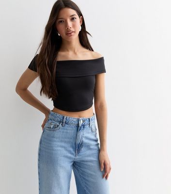 New Look Black Jersey Bardot Crop Top. A need-it-now basic, this black bardot top will see you through this summer and the next (and the next). Black. Bardot neckline. Short sleeves. Cropped length. Stretch jersey fabric. Slim fit. Model is 5'8"/173cm and wears UK 10/EU 38/US 6. Black Bardot Top, Bardot Crop Top, Bardot Neckline, Bardot Top, Vegan Brands, Plus Size Black, Black Jersey, Denim Gift, 20's Dress