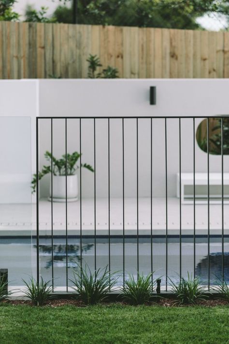 Pool With Fence Landscaping, Wrought Iron Pool Fence Ideas, Wrought Iron Exterior Railing, Black Metal Pool Fence, Black Pool Fencing, Pool Fences Ideas, Black Pool Fence, Fences Around Pools Ideas, Metal Pool Fence