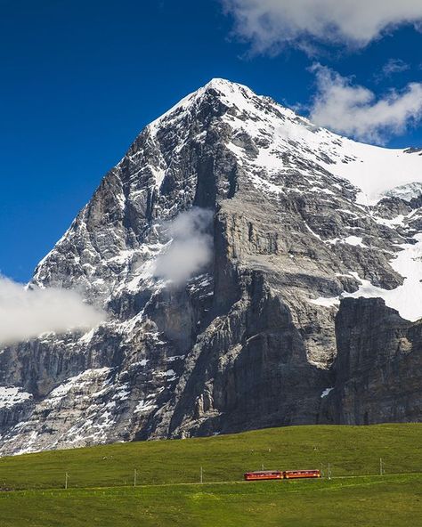 Looking up at the Eiger North Face with the White Spider glistening - the snow field made famous by Heinrich Harrer of the same name describing the first successful ascent of the North Face. One of the world's iconic mountain climbing destinations ...and for the movie buffs made famous by Clint Eastwood in The Eiger Sanction #eiger #switzerland #climbing . . . . . #adventure #getoutside #travelphoto #mountains #roamtheplanet #liveforthestory #exploretheglobe #LoveTheWorld #instapassport #igtrave Eiger Switzerland, Eiger Sanction, Eiger North Face, Snow Field, White Spider, Amazing Places On Earth, Mountain Climbing, Movie Buff, Clint Eastwood