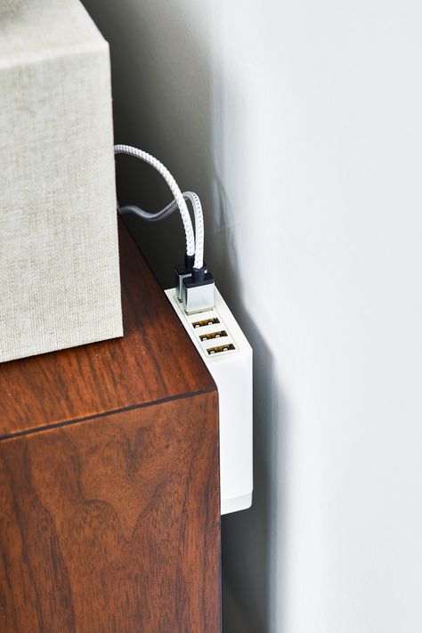 Nightstand Cable Management, Desk Charging Station Ideas, Electronic Organization Storage, Nightstand Cord Organization, Hidden Charging Station Ideas, Cable Tidy Ideas, Game Console Organization, Organizing Electronics, Bedside Organization