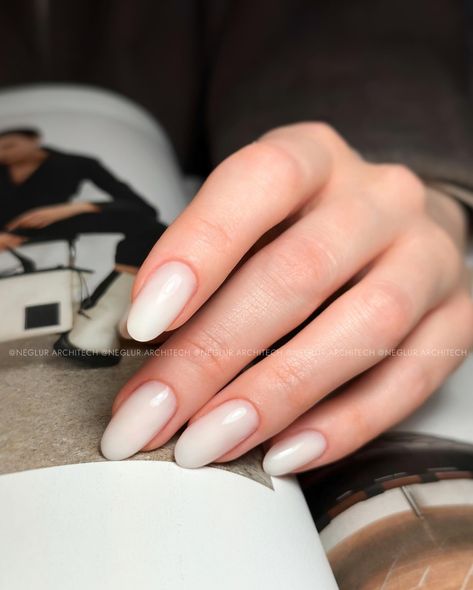 Wedding manicure 💍 milky white almond nails @tienda.ro nail products: ▫️Milky White Gel ▫️Ultra Finish Top Gelaxyo —Neglur Architech, Certified Nail Technician, Reykjavik #neglur #gelneglur #neglurinsta #weddingnails #reykjavik Short Oval Milky White Nails, Milky White Wedding Nails, Milky Almond Nails, Milky Manicure, Milky White Almond Nails, White Almond Nails, Wedding Manicure, White Manicure, Milky Nails