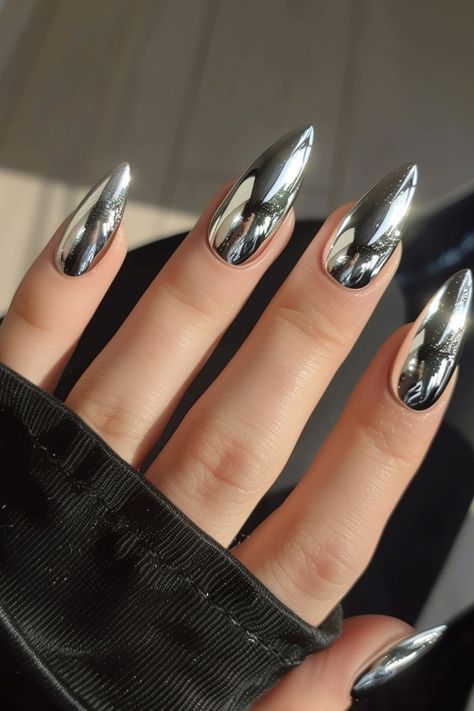 Get ready to dazzle and shine with the hottest nail trend of the season: chrome nails! This mesmerizing look is guaranteed to elevate your style and turn heads wherever you go. So, if you’re looking Nail Shine Design, Metallic Grey Nails, Nail Designs Gray, Mirrored Nails, Long Chrome Nails, Silver Chrome French Tip Nails, Silver Chrome Nails Designs, Chrome Stiletto Nails, Chrome Nail Designs