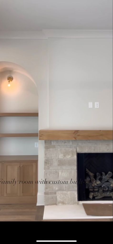 Fireplace On Short Wall Of Vaulted Ceiling, English Cottage Stone Fireplace, Built In Arched Bookshelves Around Fireplace, Short Fireplace Mantle, Fireplace Ideas Simple, European Farmhouse Fireplace Ideas, Gas Fireplace No Hearth, Stone Fireplace Halfway Up Wall, Stone Fireplace And Built Ins