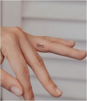 Infinity Eye Catching Finger Tattoo Finger Love Tattoo, Infinity Hand Sign Couple, Infinity Symbol Finger Tattoo, Tiny Tattoos Infinity, Hand Tattoos Infinity, Infinity Hand Tattoo, Mini Infinity Tattoo, Infinity Minimalist Tattoo, With You Tattoo