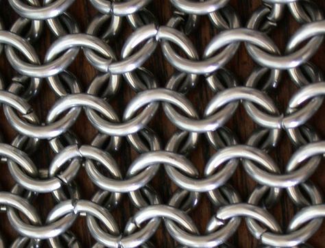 Chainmail (aka: chainmaille, chain mail, chain maille, maille or mail) is made… Make Chainmail, Chainmail Glove, Armour Tattoo, Shoulder Armor Tattoo, Chainmail Armor, Viking Cosplay, Geek Diy, Viking Armor, Armband Tattoos