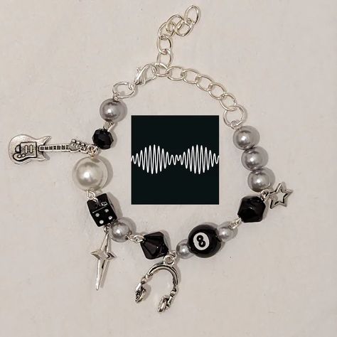 8 ball bracelet  Arctic Monkeys themed charm bracelet Arctic Monkeys Jewelry, Arctic Monkeys Bracelet, Album Bracelets, Handmade Charm Bracelets, Gothic Bracelet, Gelang Manik-manik, Artic Monkeys, Pola Gelang, Gelang Manik