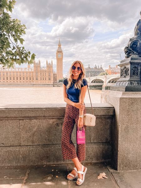 Where to take photos in London, What to wear in London, Big Ben and Elizabeth Tower in London, Pre fall outfit: printed wide leg crop pants and cropped tee #LTKSeasonal What To Wear In London, Pre Fall Outfits, Elizabeth Tower, London Big Ben, Wide Leg Crop Pants, Travel More, More Travel, Bucket List Travel, Travel List