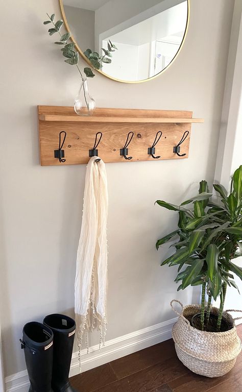 "This beautiful, rustic coat rack is the perfect way to add some simple, elegant charm to your front entryway. You'll be able to hang your coats on the hooks and use the shelf area for other accessories such as wallets, sunglasses, and other decor items. This modern farmhouse entryway organizer is sturdy and the perfect addition to any front hallway. Each coat rack is handcrafted from carefully selected solid pine wood and features high quality stains and materials. CUSTOMIZE: You can customize Coat Hooks Entryway, Farmhouse Coat Hooks, Small Mudroom Ideas, Entryway Coat Rack, Rustic Coat Rack, Entryway Organizer, Hook Rack, Entryway Organization, Small Entryway