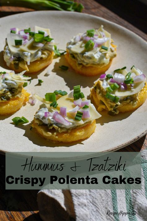 These hummus and tzatziki crispy polenta cakes are seriously delicious! If you are looking for a Mediterranean appetizer for parties, this is sure to be a hit! Serve them warm and get the best of both worlds, with crispy polenta and creamy hummus. Fried Polenta Cakes, Crispy Polenta Cakes, Fried Polenta, Crispy Polenta, Mediterranean Appetizers, How To Cook Polenta, Polenta Fries, Creamy Hummus, Tzatziki Recipes