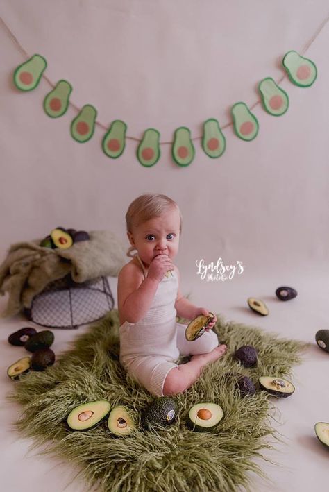 Yes, it's perfectly OK to celebrate your first birthday with an avocado smash. Photographer Lyndsey Wright of @lyndseysphotoco got this fun shot. Baby First Birthday Pictures, Avocado Smash, Cake Smash Theme, Avocado Baby, First Birthday Pictures, Green Photography, Half Birthday, Newborn Baby Boy, Fur Fabric