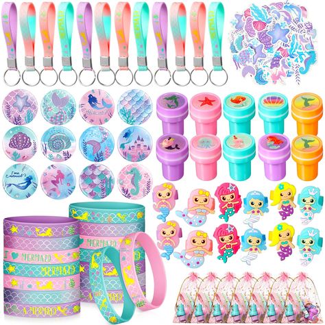 PRICES MAY VARY. Mermaid Party Gift Set: you will receive 12 pieces mermaid keychains, 12 pieces mermaid bracelets, 12 pieces mermaid stampers, 12 pieces mermaid pin badges, 12 pieces mermaid rings, 12 pieces organza bags, 50 pieces mermaid stickers, abundant in quantity, meeting your different decorative needs, enough to share with your friends Mermaid Theme Design: these mermaid birthday party favors contain rich mermaid theme elements, cute and vivid, prefect for mermaid birthday party suppli Mermaid Birthday Games Party Activities, Little Mermaid Birthday Party Pink, Ariel Themed Birthday Party Games, Mermaid 1st Birthday Party Games, Mermaid Birthday Party Loot Bags, Mermaid Birthday Party Games Kids, Under The Sea Birthday Party Favors Goody Bags, Mermaid Theme Goodie Bags, Mermaid Birthday Party Goodie Bags