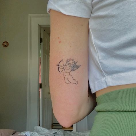 Cherub Tattoo Placement, Cherub Arrow Tattoo, Angel Bow And Arrow Tattoo, Cupid Tattoo Ideas, Fine Line Cherub Tattoo, Cherub Angel Tattoo Simple, Cupids Bow Tattoo, Cherub Tattoo Designs, Archer Tattoo