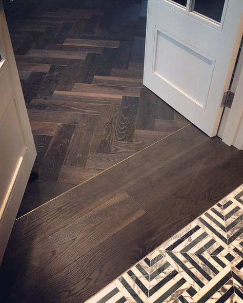 Beautiful dark, rich in tone, engineered herringbone floors with feature brass inlay to the border.  #engineeredflooring #interiordesign #parquet floor #woodfloorideas #solidwoodfloor #herringboneflooringideas Parquet Floor Living Room, Dark Wood Herringbone Floor, Herringbone Floor With Border, Dark Herringbone Wood Floor, Herringbone Floor Hallway, Brass Inlay Floor, Dark Parquet Flooring, Herringbone Floor Kitchen, Wood Floor Border