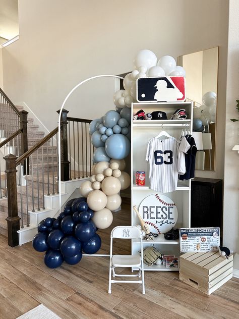 Neutral baseball themed birthday party with a DIY locker and balloon arch Elegant Baseball Theme Party, Dodger Theme First Birthday, Baseball Themed Balloon Arch, Dodgers Birthday Party Ideas, Baseball 10th Birthday Party, Dodgers Theme Birthday Party, Sandlot Birthday Party Ideas, 2nd Birthday Baseball Theme, Sports Theme Party Ideas