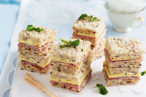 15 Tea Sandwiches To Enjoy With a Proper Cuppa High Tea Sandwiches, Tea Party Sandwiches Recipes, Chutney Sandwich, High Tea Food, Tea Party Sandwiches, Tea Sandwiches Recipes, Lunch Wraps, Afternoon Tea Recipes, Party Sandwiches