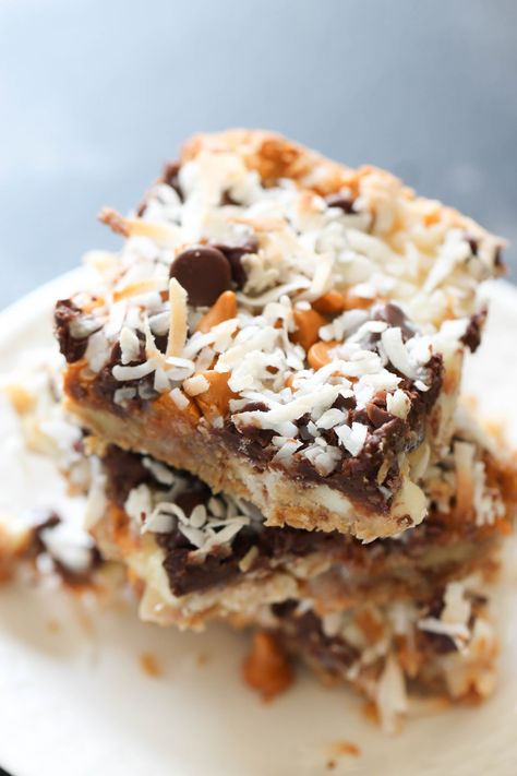 Seven Layer Bar Cookies Recipe (AKA Magic Cookie Bars) Magic Cookie Bars Recipe, Magic Cookie Bar, Homemade Lemon Bars, Seven Layer Bars, Magic Cookie Bar Recipe, Magic Cookie Bars, Six Sisters Stuff, Easy Freezer Meals, Sugar Cookie Bars