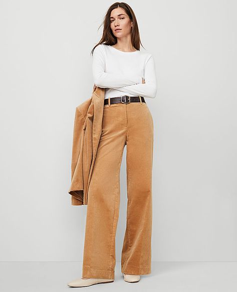 A modern must-have with a statement leg and flattering high waist. Front zip with double hook-and-bar closure. Belt loops. Front off-seam pockets. Back besom pockets. Lined.,Leg Shape:Wide Leg – a modern must-have with a statement leg and flattering high waist,Rise:High rise: sits 1/2" to 1" below natural waist,Imported:Imported,Fit:Relaxed & easy,Length:Full length: 31" inseam with 23" leg opening,Fabrication:98% Cotton, 2% Spandex,Garment Care:Machine Washable The Wide-Leg Pant in Corduroy by Tan Corduroy Pants Outfit, Camel Color Outfits, Corduroy Wide Leg Pants, Corduroy Pants Outfit, Color Outfits, Corduroy Pants Women, Corduroy Pant, Corduroy Pants, Size 00