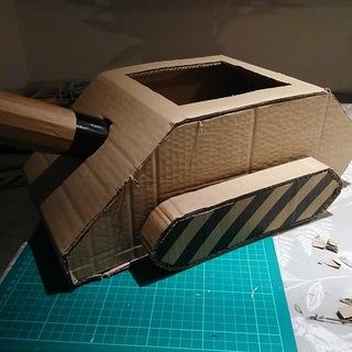 Cardboard Army Tank Diy, Diy Tank Costume, Tank Costume Diy, Army Tank Costume, Cardboard Tank Diy, Diy Cardboard Box Car, Diy Army Tank, Cardboard Race Cars, How To Make A Cardboard Box Car