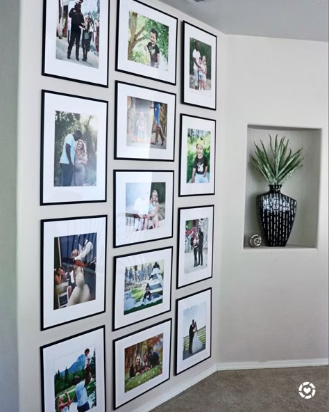 One of the easiest ways to display photos is with a gallery wall. I was searching for a space in our new home to recreate our gallery wall, and this turned out to be perfect! I updated some of the photos (because let’s be honest...I hadn’t printed any in three years 🤦🏼‍♀️) and I fell in love all over again!   I think we’re do for some more family photos (don’t tell my husband 😂).  . . .  @target: 16x20 photo frames @amazonhome: 16x20 white picture mats with white core bevel cut for 11x14  @as Elegant Picture Wall Ideas, Group Of Photos On Wall, Master Bedrooms Photo Wall, 16x20 And 11x14 Gallery Wall, Gallery Wall With 11x14 Frames, Large Framed Photos On Wall, Long Photo Wall, Sepia Photography Gallery Wall, Gallery Wall Ideas Corner