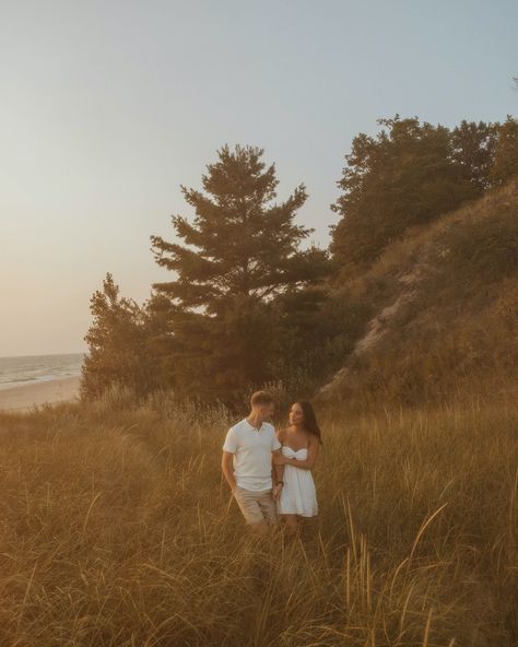 Living for fun, natural, and in the moment engagement sessions 🥹🤍 I’m so excited for January, Caitie and Daire!!! 🫶🏼 only a few more weeks of beach sessions! I’m going to miss them! #beach #beachsession #sunset #sunsetphotography #goldenhour #goldenhourphotography #sanddunes #michigan #michiganphotographer #westmichiganphotographer #weddingphotographer #love #couple #fiance💍 #bridetobe #2025bride Fall Beach Engagement Photos, Coastal Engagement Photos, Engagement Photo Shoot Beach, Fall Beach, Golden Hour Photography, Photos Inspo, Beach Sessions, Engagement Photos Fall, Beach Engagement Photos