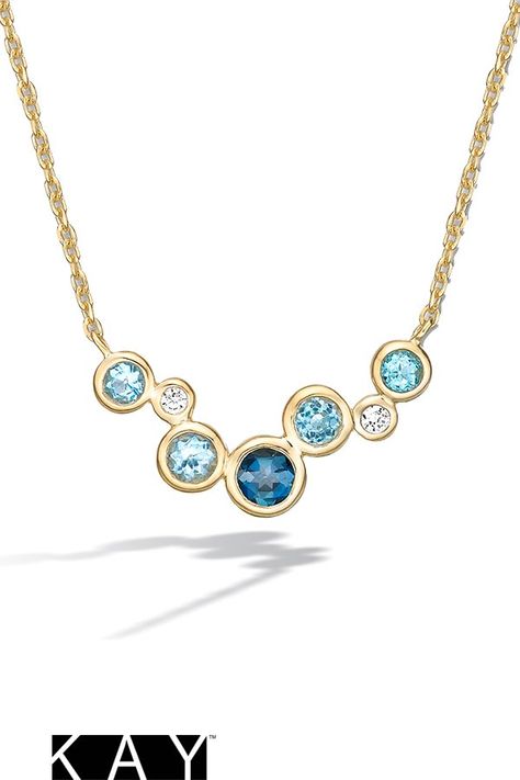 This unique ombré necklace features blue topaz gemstones and diamonds set in yellow gold. Luxury Blue Topaz Jewelry With Gemstone Accents, Luxury Topaz Necklace With Gemstone Accents, Fine Jewelry Blue Topaz Pendant, Luxury Blue Topaz Yellow Gold Necklace, Luxury Topaz Pendant Necklace, Ombre Necklace, Gold Stock, Diy Jewelry Earrings, Jewelry Advice