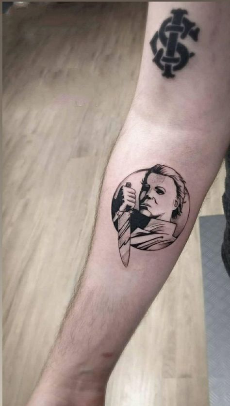 50+ stunning Michael Myers tattoo ideas that will make your blood run cold: meanings, cost estimation, and the best tattoo artists are gathered in our article. Michael Myers Tattoo Ideas, Micheal Myers Tattoo, Michael Myers Tattoo, Myers Tattoo, Clothes Game, E.t Tattoo, Horror Tattoos, Tattoo Halloween, Horror Movie Tattoos