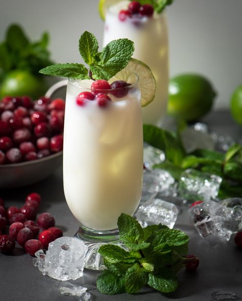 This easy coconut rum holiday cocktail is a little high five from the tropics with a splash of Christmas cheer | www.therecipewench.com Coconut Rum Recipes, Coconut Rum Punches, Coconut Rum Drinks, Resep Koktail, Rum Cocktail Recipes, Malibu Coconut, Rum Recipes, Rum Cocktails, Christmas Cocktail