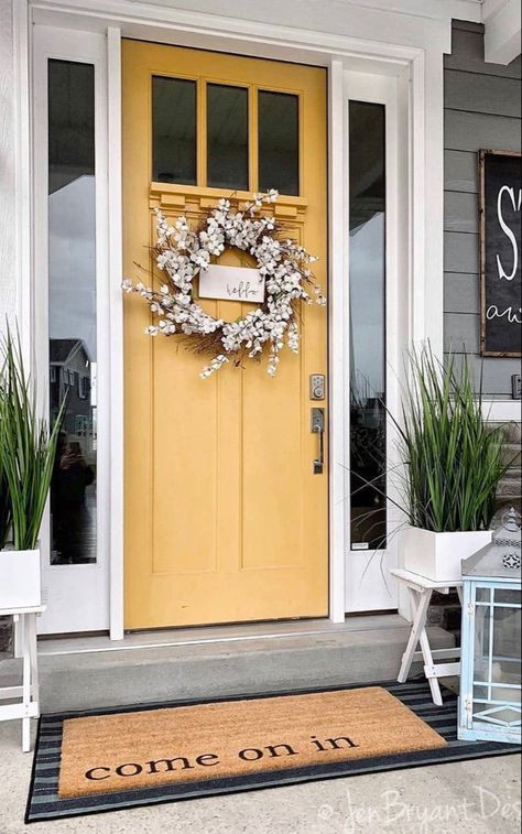 A well designed door is a simple way to add style to your home. Yellow Front Door, Exterior Door Colors, Cottage Front Doors, Front Door Paint Colors, Yellow Door, Door Colors, Door Paint Colors, Front Door Porch, Painted Front Doors