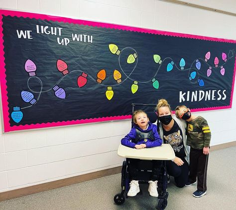 Light Up The World With Kindness Bulletin Board, Light Up With Kindness Bulletin Board, Shine Your Light Bulletin Board, Light Up The World With Kindness, Light Up The Season With Kindness, Spotlight Bulletin Board Ideas, Winter Kindness Bulletin Board, Cup Of Kindness Bulletin Boards, Christmas Light Bulletin Board