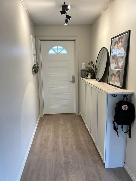 Ikea tips, hacks and more! | This for you guys that have a long and narrow hallway… we used billy/oxberg cabinets with doors as shoe storage, painted them in the same color as t... Ikea Havsta Hallway, Ikea Narrow Hallway, Ikea Billy Hallway, Hallway With Cupboards, Built In Shoe Storage Entrance, Front Entryway Ideas Shoe Storage, Storage In Narrow Hallway, Storage For Narrow Hallway, Hallway Narrow Storage