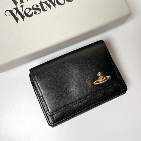 Vivienne Westwood Trifold Wallet 3318M1J Black NEW WATER ORB Description Guaranteed 100 % Authentic Product ! Condition: New Brand Vivienne Westwood color black style vintage Features tri-fold                                                                                       Visit our store: pinzou-japan Store ※ The color might be slightly different from the actual product due to the effect of light and monitor setting ※ Delivery to overseas may be delayed due to disasters, bad weather, etc., Vivien Westwood Wallet, Black Wishlist, Expensive Wishlist, Vivienne Westwood Purse, Wallet Aesthetic, Vivienne Westwood Wallet, Wood Wallet, Cute Wallet, Japan Store