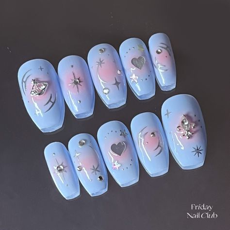 Silver stars and hearts shine along with the subtle pops of pink glow  Inspired by the luminous light in the galaxy, shooting stars and Vivienne Westwood spaceship stands out in the bright blue color. Rhinestones and silver decorations makes it more y2k! Vibrate a little higher with this fun nail~ This set is a ✨𝐬𝐡𝐨𝐫𝐭 𝐜𝐨𝐟𝐟𝐢𝐧 𝐧𝐚𝐢𝐥✨ 📦 What's in the complementary nail kit? -- Press on nail set -- 24 adhesive tabs -- Mini nail file  -- Mini nail buffer -- Manicure plastic stick -- Al Y2k Vivienne Westwood, Ongles Baby Blue, Blue Aura Nails, Nails Y2k, Aura Nails, Baby Blue Nails, Blue Aura, Airbrush Nails, Korean Nails