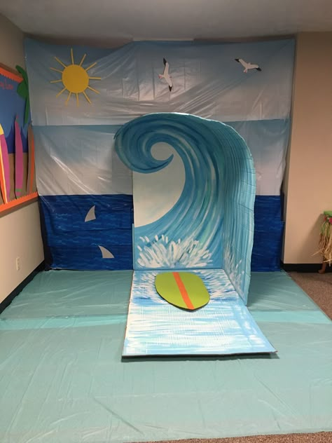 Wave Decorations Party, Cardboard Waves Diy, Waves Decoration Ocean Themes, Surfs Up Decorations, Surf Theme Party Decorations, Diy Wave Backdrop, Beach Stage Decor, Diy Waves Ocean Cardboard, Vbs Beach Theme