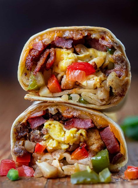 A Cowboy Breakfast Burrito is a savory and hearty breakfast option loaded with meats, vegetables, seasonings, eggs, and cheese wrapped in a tortilla and pan-fried to perfection! It is sure to satisfy even the biggest appetites and keep you going all morning. Ultimate Breakfast Burrito, Cowboy Breakfast Burrito, Breakfast Ideas For Restaurant, Fried Egg Breakfast Ideas, Steak Breakfast Burrito, Unique Breakfast Ideas, Burritos Recipes, Cowboy Breakfast, Outdoor Breakfast