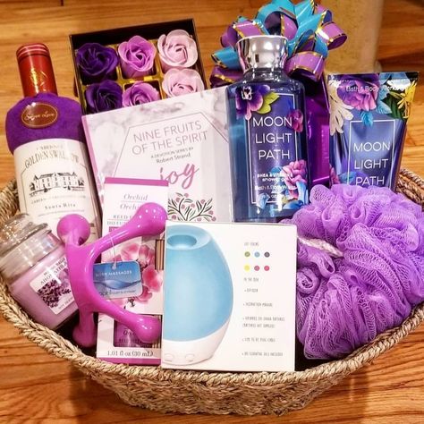 This gift basket consist of a small weave basket which consist of the following items: *Moonlight Path shea and vitamin E shower gel by Bath and Body Works; *Moonlight Path Shea and Vitamin E body cream; *21 Lavender scented rose design soap petals; *Wine bottle designed hand towel; *Fresh and clean orchard scented reed diffuser; *Bath pouf; *Body Massager; * Nine Fruits of The Spirit "Joy" Devotional Series by Robert Strand; *Wrapped Gift (Teacher's Appreciation Mug) *Aroma Diffuser battery ope Bath And Body Works Gift Ideas Baskets, Bath And Body Works Raffle Basket, Bath And Body Work Gift Basket Ideas, Bath And Body Works Gift Baskets, Bath And Body Works Gift Ideas, Bath Gift Basket Ideas, Lavender Gift Basket, Tricky Tray Baskets, Blue Gift Basket