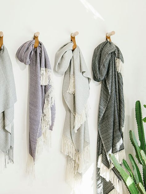 Display throw blankets on the wall so they can stop taking up a whole shelf in your linen closet. Hanging Blankets On Wall, Throw Blanket Storage, Office Closet Ideas, Linen Closets, Blanket On Wall, Linen Closet Organization, Wall Closet, Organization Decor, Linen Storage