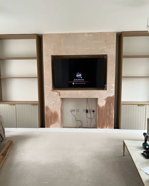 Media wall step-by-step in pictures 📸 Thought it might be useful to share this process of how we created our media wall. 🌟 We made the TV gap bigger incase we buy a bigger TV in the future 🌟 We also made the fireplace gap bigger for this reason too 🌟 There is a false wall behind the fireplace for easy access to the plug sockets #stepbystep #mediawallsteps #mediawalldesign #mediawallprogress #shelving #ikeabesta #ikeahack #handmade #diy #diymediawall #diyguide #homedesignideas #buildyour... Chimney Media Wall, Stove Media Wall, Media Wall Fireplace, Diy Media Wall, False Wall, Plug Sockets, Big Tv, Ikea Besta, Diy Fireplace