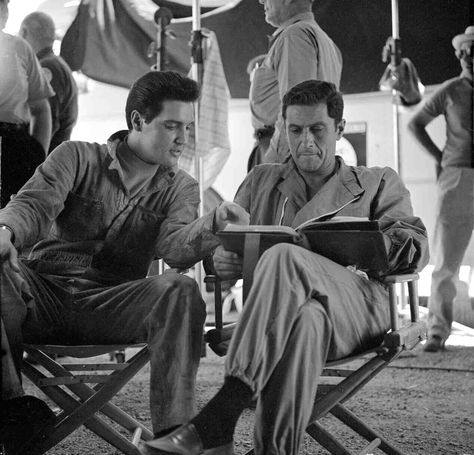 Check out this image from TCM.   Medium BTS shot of Elvis Presley as Lucky Jackson and Cesare Danova as Count Elmo Mancini, sitting in director's chairs looking over script. Elvis Sitting In Chair, Elvis Today, Elvis Presley Movies, Vegas Fun, Marie Presley, The Best Movies, Turner Classic Movies, Elvis Movies, Ann Margret