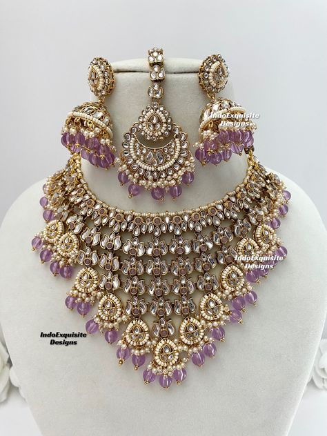 Premium quality Kundan Necklace comes with Jhumki Earrings and Tikka/ Indian Jewelry/Premium Quality Polki and Kundan Jewelry/lavender/lilac/light purple  All items are shipped from Brampton, Ontario, Canada. If you need your item by a certain day, please reach out to us for express delivery option before placing the order so that we can update the shipping for you. Standard shipping/delivery timeline Below are the delivery timeline estimates. We dispatch all orders by the next business day. ---> USA delivery timeline * 3-5 business days to major urban centers in USA. It may take 1-2 days extra to remote locations ---> Canada delivery timeline  * 2-3 business days - GTA  & Montreal  * 2-4  business days - Rest of Ontario/Quebec * 2-6 business days-  Rest of Canada    ---> Europe/Middle Eas Purple Necklace Indian, Lavender Beaded Necklace, Purple Jewelry Set, Hell Lila, Brampton Ontario, Indian Wedding Jewelry Sets, Bridal Jewelery, Perhiasan India, Kundan Necklace Set