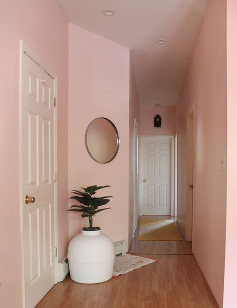 This pink entryway is an extension of a blogger's bohemian living room. The paint color is Baby Soft by Clare. #bohemian #boho #bohodecor #bohohomedecor #bohemiandecor #eclecticdecor Blush Wall Color Bedroom, Coral Pink Wall, Peach Hallway, Blush Pink Hallway, Pink Wall Room Ideas, Dark Pink Walls, Pink Wall Painting Ideas, Pink Living Room Paint, Small Hallway Paint Colors