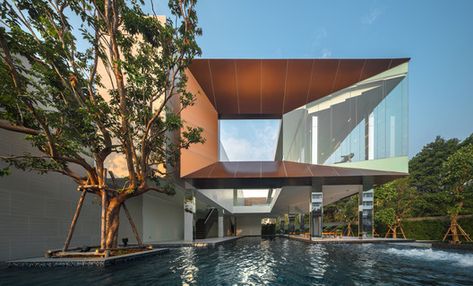 Baan Klang Mueang Clubhouse / ForX Design Studio | Netfloor USA Casa Club, Modern Mansion, Glass Roof, Interior Architect, Facade Design, Urban Area, Club House, Landscape Architecture, Ground Floor