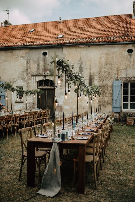 Eucalyptus garlands on Edison  lights for this French country destination wedding French Countryside Table Setting, A Night In Tuscany Theme, Hanging Eucalyptus Wedding, Modern Intimate Wedding, Timeless Country Wedding, Desert Wedding Aisle, Wedding In The Countryside, Medditeranean Style Wedding, Country French Wedding