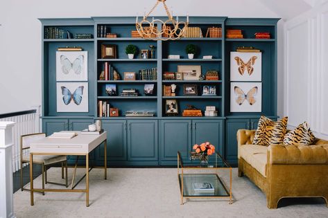 Custom-built shelving and cabinetry are painted in a rich teal hue. French Grey Paint, Jolie Paint, Cognac Leather Sofa, Wall Colours, Pool Room, Sesame Ginger, Ginger Dressing, Farmhouse Master, New Orleans Homes