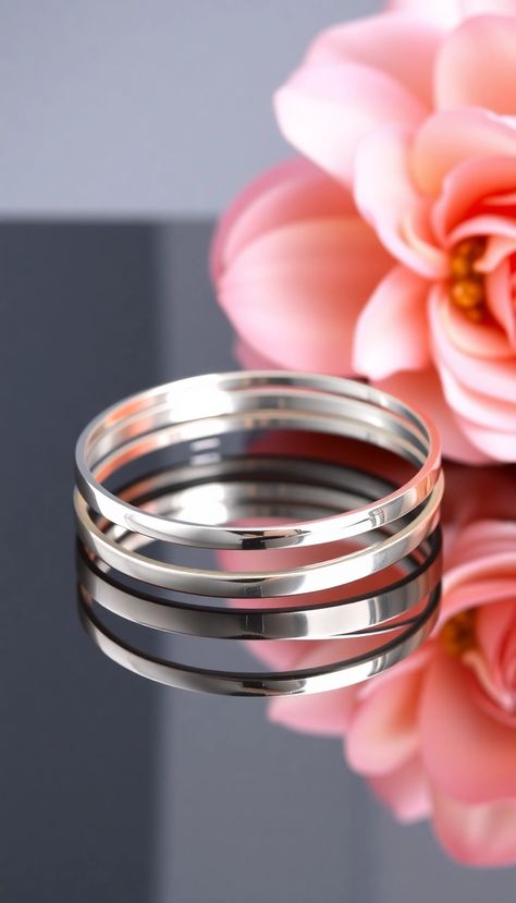 For the modern bride, a contemporary silver bangle set provides a chic alternative.

With sleek designs and a polished finish, these bangles can be styled for both traditional and contemporary weddings. Bridal Bangles, Contemporary Wedding, The Modern Bride, Silver Bangle, Wedding Look, Bangle Set, Bridal Look, Modern Bride, Silver Bangles