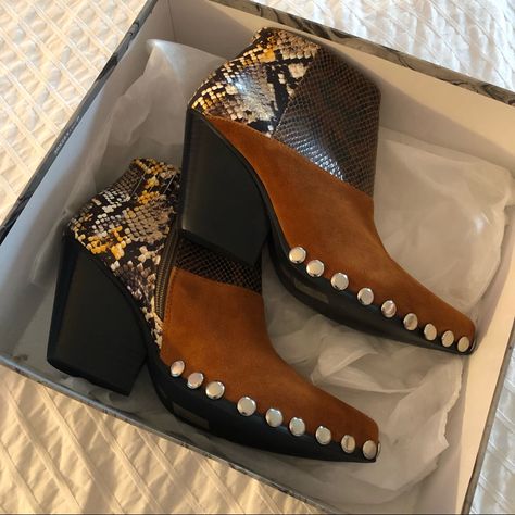 These Color Blocked Boots Are A Dream But I Tried Them On Once And They’ve Been In The Box Since. Perfect Cowgirl-Esque Shoes For A Night Out! Comes With Extra Studs (Third Pic) And Dust Bags 3” Heel Height/ Leather+Suede Upper Unfortunately The Top Of The Box Is A Bit Banged Up, I Will Fix It Up The Best I Can Before Shipping Out! Jessica Simpson Zellya Boots, Black Leather Cowgirl Outfit, Leather Booties With Stacked Heel And Snip Toe, Brown Block Heel Moto Boots For Fall, Brown Moto Boots With Stacked Heel For Fall, Brown Moto Boots With Block Heel For Fall, Brown Snip Toe Booties For Fall, Fall Brown Snip Toe Booties, Western Brown Booties With Stacked Heel