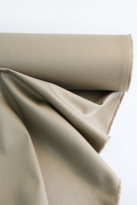 Betty is a unique four-way stretch gabardine with a tight weave and a subtle twill coming in a warm caramel colourway. With a brushed front it holds a soft handle and will support gentle drape and soft structure perfectly. Hard wearing, it's ideal for outerwear garments such as jackets, trenches or light coats, and would work great for pant weight garments. Composition: 97% Cotton, 3% Lycra Width: 128cm wide Weight: 270GSM Origin: Made in Japan Care: Cold machine wash You can order a swatch here, and a thread match here. For any further enquiries, please get in touch here. Tool Tote Bag, Tool Tote, Structured Jacket, Thread & Yarn, Bridal Fabric, Light Coat, Wool Wash, Fabric Stores Online, Fabric Shop