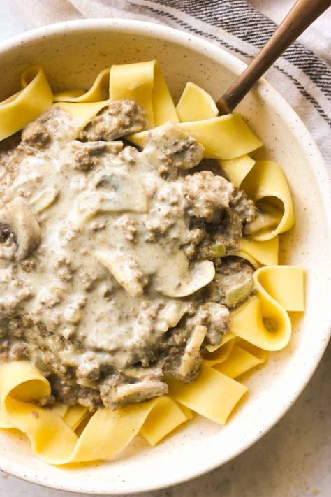 Bison Stroganoff Recipe - Creamy, rich and flavorful bison stroganoff is a delicious take on a classic noodles recipe. This easy version includes ground bison, mushrooms, heavy cream and sour cream for an ultra savory main dish that is sure to satisfy! Serve over hearty egg noodles for a complete meal that's ready to enjoy in less than 30 minutes. | The Top Meal Bison Ground Beef Recipes, Bison Stroganoff, Bison Burger Recipe, Ground Bison Recipes, Bison Recipes, Ground Bison, Beef Recipe Instant Pot, Rustic Recipes, Buttered Noodles