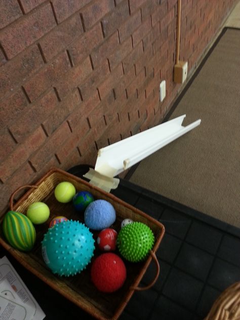 A gutter and balls - an Invitation to Play that will  support the Trajectory Schema. Schema Ideas, Trajectory Schema, Infant Classroom, Toddler Classroom, Force And Motion, Creative Curriculum, Invitation To Play, Outdoor Classroom, Preschool Science